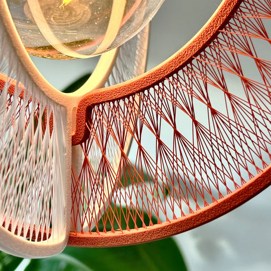Close-up of a modern chair with geometric design and blurred background