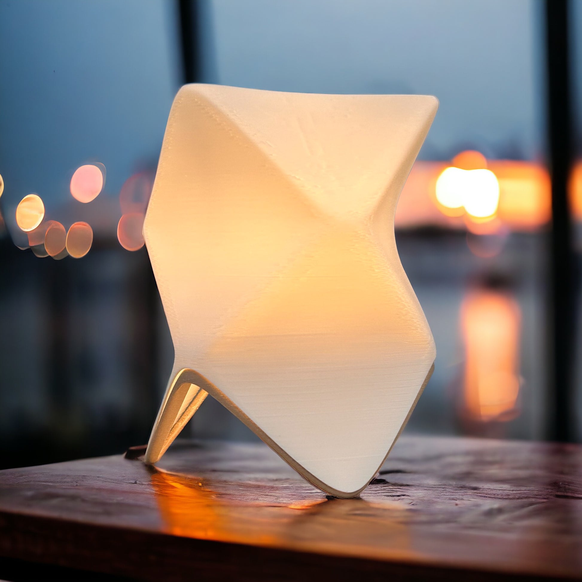 Modern lamp on a table with a blurred background of lights