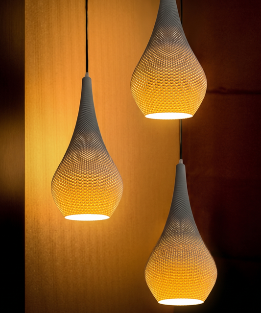Three hanging pendant lights with a textured design on a warm-toned background