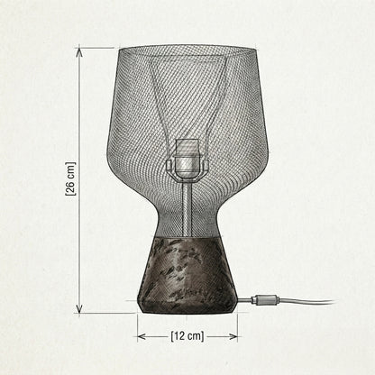 Technical dimension drawing of a table lamp with a wide mesh shade, narrow neck, and textured base on a light background, showing height [26 cm], width [12 cm], and base-to-socket distance.