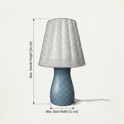 A line-drawn dimension diagram of a table lamp on a light textured background, showing the lampshade height labeled as 34 cm and the base width labeled as 12 cm.