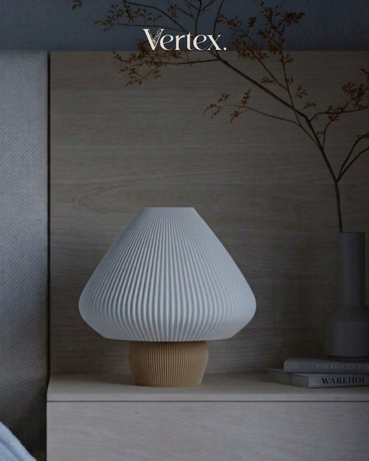 White textured table lamp on a wooden surface with 'Vertex' branding.