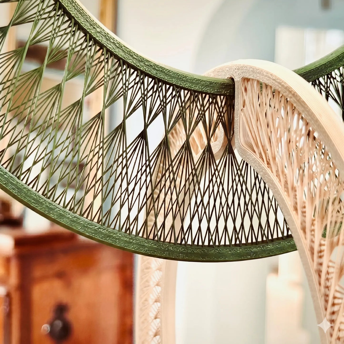 Close-up of a wicker chair with a geometric pattern in a blurred indoor setting
