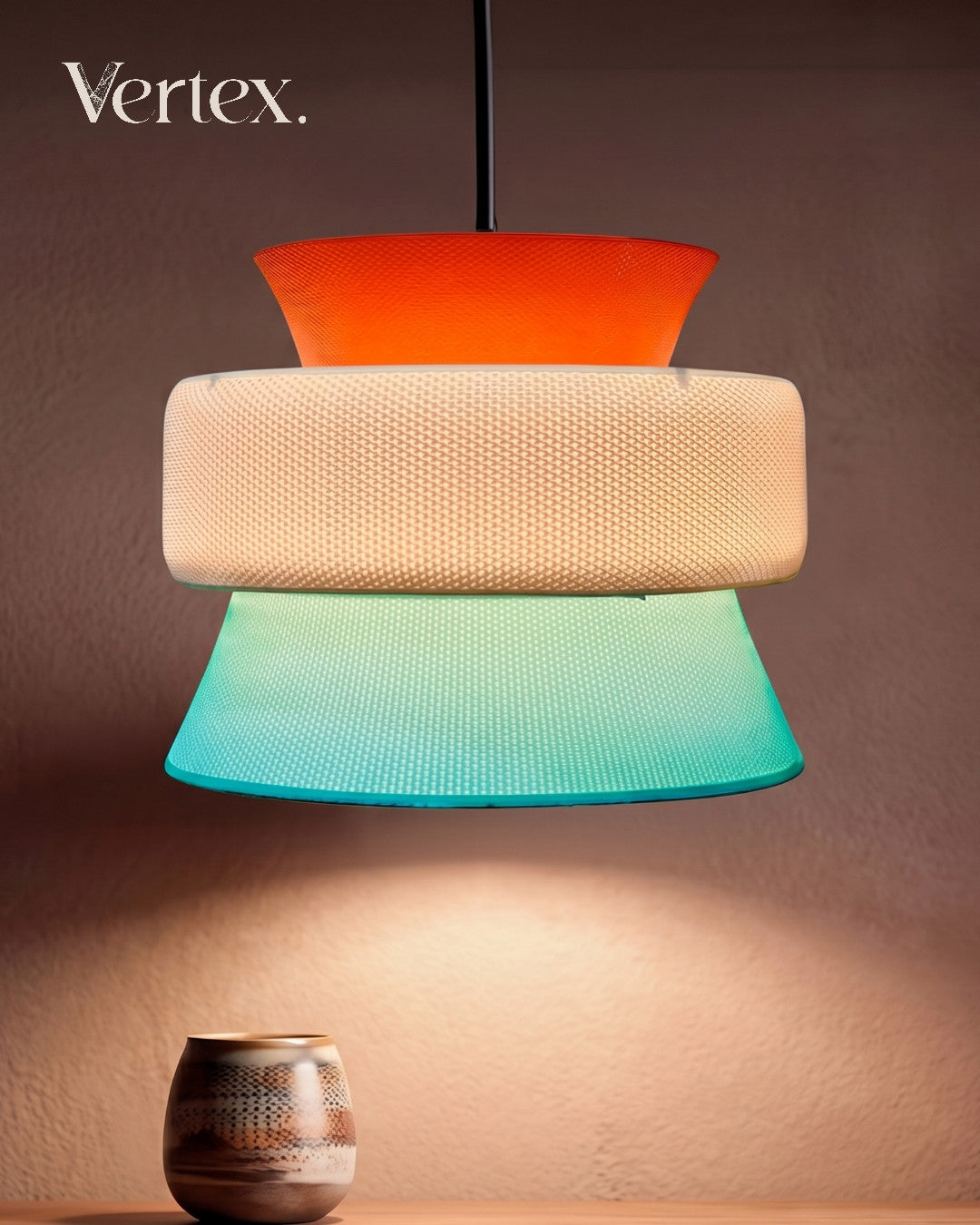 Colorful lamp with three distinct shades on a brown background, featuring the brand 'Vertex'.
