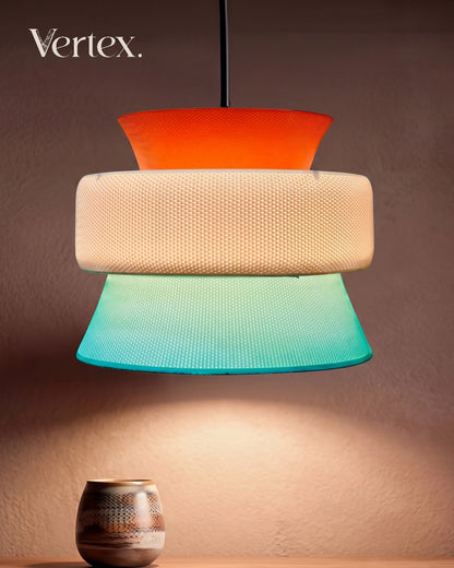 Colorful lamp with three distinct shades on a brown background, featuring the brand 'Vertex'.