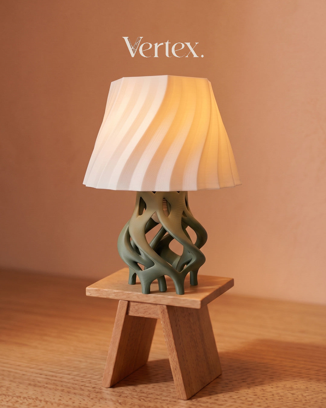 Decorative lamp with a unique base on a wooden stand against a brown background, featuring the brand 'Vertex'.