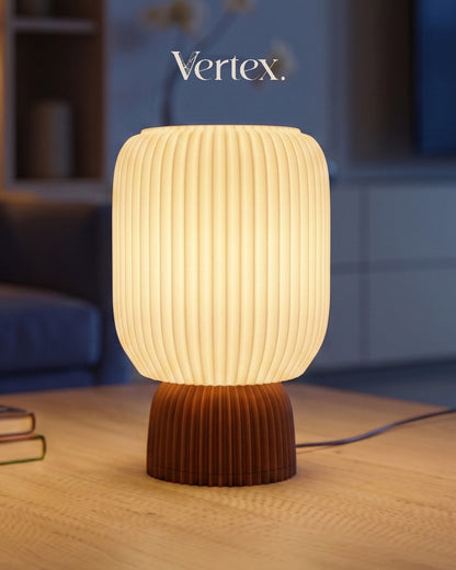 Table lamp with ribbed design on a wooden surface, blurred background