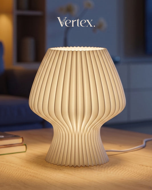 Beige textured table lamp on a wooden surface with 'Vertex.' branding.