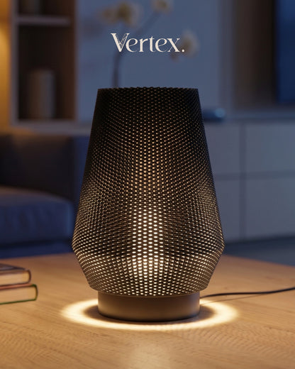 Decorative lamp with textured design on a wooden surface, blurred background